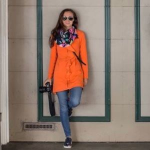 BEBE orange short trench with zipper closure. Excellent condition. Size XS